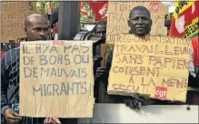  ?? Picture: AFP PHOTO/DOMINIQUE FAGET ?? DIVERSE SOCIETY: People at a demonstrat­ion yesterday to protest against austerity and the French government's social policy, hold placards reading, ‘There are no good and bad migrants’ (left).