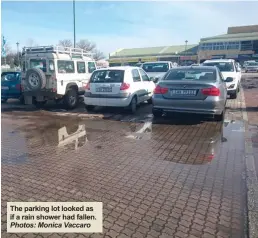  ?? Photos: Monica Vaccaro ?? The parking lot looked as if a rain shower had fallen.