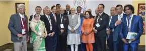  ??  ?? Prime Minister of India, Narendra Modi (centre) with recipients of the Pravasi Bharatiya Samman Award including the Ba-based founder of the Vinod Patel group, Vinod Patel (second from right).