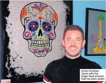  ?? ?? Artist Christian Taylor with the Sugar Skull artwork that has been stolen