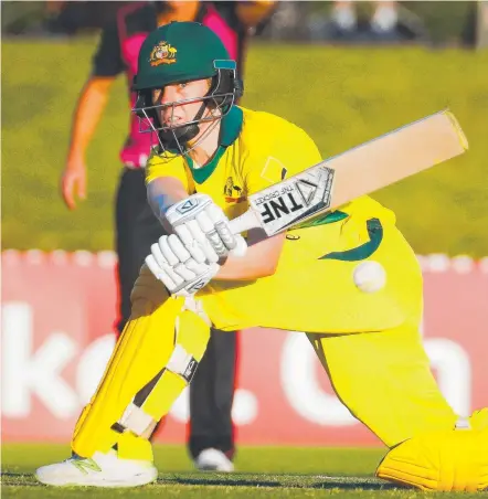  ?? Picture: AFP ?? Australia's Elyse Villani sweeps the ball during her decisive, undefeated half-century yesterday.