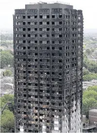  ??  ?? The remains of Grenfell Tower