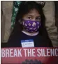  ?? RON HARRIS — THE ASSOCIATED PRESS ?? A child holds a sign at a rally Wednesday in Atlanta on the anniversar­y of violence that left eight people shot and killed at various massage businesses in 2021.