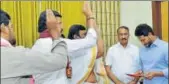  ?? HT FILE ?? Priests bless YSR Congress president YS Jaganmohan Reddy (right) at his residence recently.