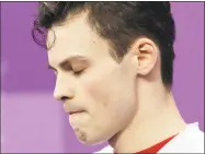  ?? David J. Phillip / Associated Press ?? John-Henry Krueger of the U.S. reacts after his men’s 1,500 meters short-track speedskati­ng semifinal at the 2018 Winter Olympics on Saturday.