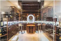  ??  ?? The Domaines de la Rive-Sud home boasts a spacious wine cellar.