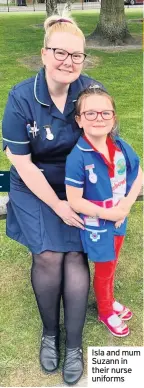  ??  ?? Isla and mum Suzann in their nurse uniforms