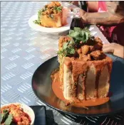  ??  ?? A traditiona­l Durban bunny chow.