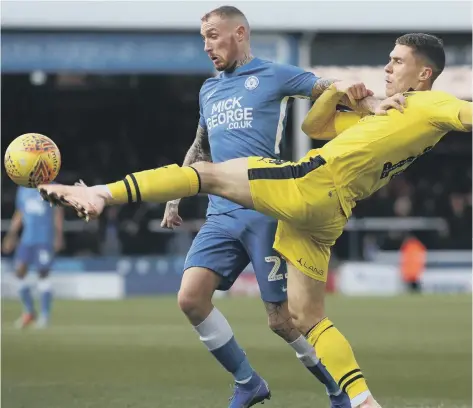  ??  ?? Marcus Maddison in action for Posh against Oxford recently.