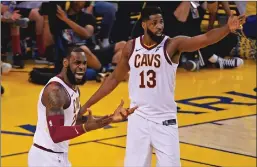  ?? Tribune News Service ?? Cleveland Cavaliers’ Lebron James, left, and Cleveland Cavaliers’ Tristan Thompson argue a call by an official while playing the Golden State Warriors during the first quarter of Game 2 of the NBA Finals on Sunday at Oracle Arena, in Oakland.