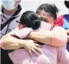  ?? PHOTO: REUTERS ?? Relatives of victims react yesterday after an accident where an overpass of the metro partially collapsed with train cars on it in Mexico City.