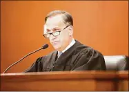  ?? Michelle McLoughlil­n ?? Superior Court Judge Thomas Moukawsher has ordered a disbarred Connecticu­t attorney to turn over documents or be taken into custody.