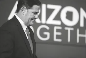  ?? ASSOCIATED PRESS ?? IN THIS JUNE 4 PHOTO, Arizona Gov. Doug Ducey speaks at a press conference about protests and COVID-19 in Arizona at the Arizona Commerce Authority Conference Center in Phoenix.