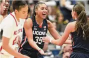  ?? Tyler Sizemore/Hearst Connecticu­t Media file photo ?? UConn guard Azzi Fudd (#35) celebrates in No. 5 UConn’s 91-69 win over No. 10 NC State in the NCAA women’s college basketball game at the XL Center in Hartford on Nov. 20, 2022.