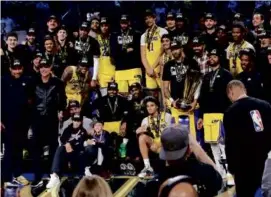  ?? ETHAN MILLER/GETTY IMAGES ?? The NBA celebrated the inaugural In-Season Tournament by giving medals, trophies, and cash to the victorious Lakers.