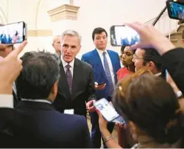  ?? MANDEL NGAN/GETTY-AFP ?? House Speaker Kevin McCarthy talks to the media about the debt vote Wednesday at the Capitol.