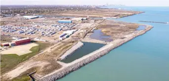  ?? ?? The site for sediment dump from the Calumet River was supposed to become parkland, but the U.S. Army Corps of Engineers plans to expand the 45 lakeshore acres on the Southeast Side for continued operations.