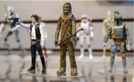  ?? SETH WENIG/THE ASSOCIATED PRESS ?? Lagging sales of Star Wars toys contribute­d to a drop in fourth-quarter sales for Hasbro, offsetting the success of other brands such as Beyblade.