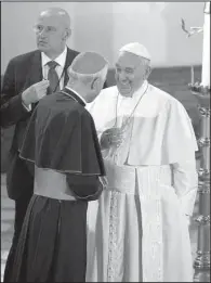  ?? AP/ALESSANDRA TARANTINO ?? Pope Francis speaks with Cardinal Donald William Wuerl (left) as he arrives at St. Patrick’s Church in Washington on Thursday after his address to a joint meeting of Congress on Capitol Hill.