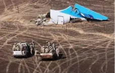  ?? MAXIM GRIGORIEV/THE ASSOCIATED PRESS ?? If the Islamic State group was behind the downing of a Russian jetliner, as it claims, it would be a frightenin­g change in tactics by the extremist group.