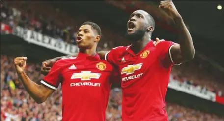  ??  ?? Romelu Lukaku (righ)t and Marcus Rashford celebratin­g Manchester United’s 4-0 defeat of West Ham… yesterday