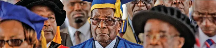  ?? PICTURE:AP ?? Zimbabwe’s president Robert Mugabe arrives at a graduation ceremony at Zimbabwe Open University yesterday. This was his first public appearance since he was placed under house arrest earlier this week.