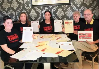  ??  ?? Jade Donlon, Michelle Fletcher, Tanya Fletcher, Christine Fletcher and Mick Fletcher with copies of the petition they organised that attracted 8,000 signatures.