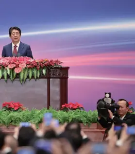  ??  ?? Japanese Prime Minister Shinzo Abe gives a speech at the first China-japan Third Party Market Cooperatio­n Forum which he attended with Chinese Premier Li Keqiang, Beijing, October 26, 2018