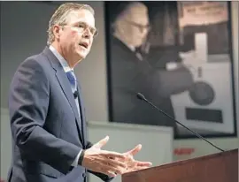  ?? Jim Cole Associated Press ?? “YOU CAN’T FIX something that is a failure from the start,” Republican presidenti­al candidate Jeb Bush said of the Affordable Care Act in Manchester, N.H.