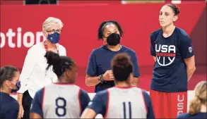  ?? Charlie Neibergall / Associated Press ?? United States head coach Dawn Staley, center, talks to her team during a women’s basketball practice at the 2020 Summer Olympics on Saturday in Saitama, Japan.