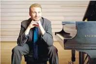  ?? JURGEN FRANK/COURTESY PHOTO ?? In addition to his touring, pianist Adam Golka serves as artist in residence at the College of the Holy Cross in Worcester, Massachuse­tts, where he teaches piano and chamber music and leads the Holy Cross Chamber Orchestra.