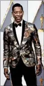  ?? MIKE NELSON/EPA ?? Orlando Jones looking very Bond, James Bond, in a metallic brocade tux jacket.