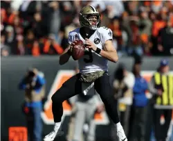  ?? (Aaron Doster/USA TODAY Sports/Reuters) ?? NEW ORLEANS SAINTS quarterbac­k Drew Brees looks to pass against the Cincinnati Bengals in the first half at Paul Brown Stadium on Sunday.