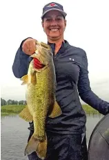  ?? PROVIDED ?? Eileen Rice proves she can fish, as well as teach, with a good largemouth bass.