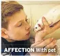  ??  ?? AFFECTION With pet