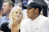  ?? PICTURE: REUTERS ?? LOVING PARENTS: Tiger Woods and ex-wife Elin Nordegren work together to raise their children.