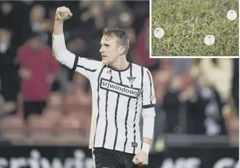  ??  ?? 0 Dean Shiels acknowledg­es Dunfermlin­e fans at the end of a game during which Falkirk fans threw rubber eyeballs on to the pitch, inset.