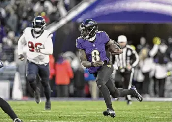  ?? Terrance Williams/associated Press ?? Ravens quarterbac­k Lamar Jackson runs the ball during the first half of the AFC divisional playoff game against the Texans. Next up is the Chiefs.