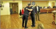  ?? BEN LAMBERT / HEARST CONNECTICU­T MEDIA ?? Torrington police officers Matthew Faulkner, Justin Tomlin and James Dickey were recognized Wednesday for coming to the aid of man who in June was threatenin­g to take his own life.