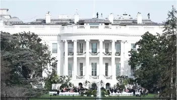  ?? — AFP photo ?? Guests arrive on the South Lawn of the White House in Washington, DC, for the wedding of Naomi Biden granddaugh­ter of Biden and Peter Neal.