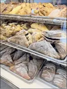  ?? Jessica Kelly / For the Times Union ?? Pristine pastries line the shelves at Bella Napoli’s Latham location.