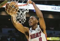  ?? MARTA LAVANDIER/AP ?? Heat rookie prospect Jamal Cain grew up idolizing Kevin Durant. Then he went out and tried to outplay the Nets’ All-Star forward.
