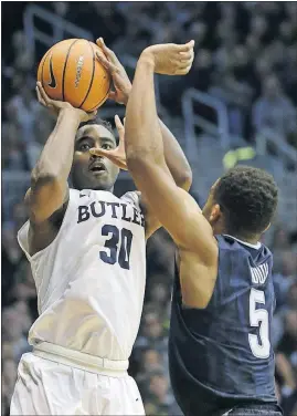  ?? [AJ MAST/THE ASSOCIATED PRESS] ?? Butler forward Kelan Martin, shooting over Villanova guard Phil Booth, led the Bulldogs with 24 points.