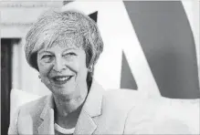  ?? DANIEL LEAL-OLIVAS THE ASSOCIATED PRESS ?? British Prime Minister Theresa May sought a compromise Monday with opposition leader Jeremy Corbyn as March Brexit deadline nears.