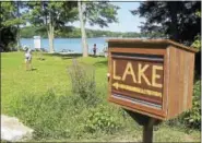  ?? FILE PHOTO —THE REGISTER CITIZEN ?? The Morris Town Beach on Bantam Lake, one of three beaches in Litchfield and Morris, was deemed safe for swimming this week after an algae outbreak earlier this month resulted in its closure by the area health department.