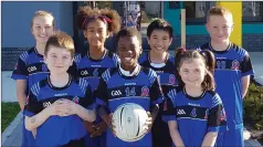  ??  ?? Pupils from Scoil Aonghusa on their way to football practice last week.