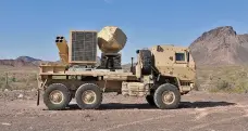  ?? Lockheed Martin; Raytheon ?? Left, a laser turret capable of detecting, tracking and destroying missiles; above, the Ku-band radio frequency system, a 360-degree radar that can detect strikes