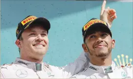  ??  ?? Nico Rosberg and Lewis Hamilton