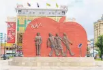  ?? ?? Top, the Beatles Ashram in Rishikesh, India; a monument to the Beatles takes centre stage in Ulaanbaata­r, Mongolia. Photos / Ivan Komarov, Flickr.com, Nikita Maykov, Adobe Stock