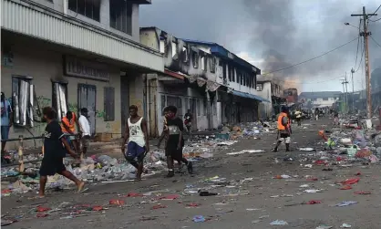  ?? ?? The Chinatown district of Honiara, Solomon Islands after three days of violence in November, 2021. China requested a heavily armed security team be allow entry to the country to protect the Chinese embassy. Photograph: Charley Piringi/AFP/Getty Images